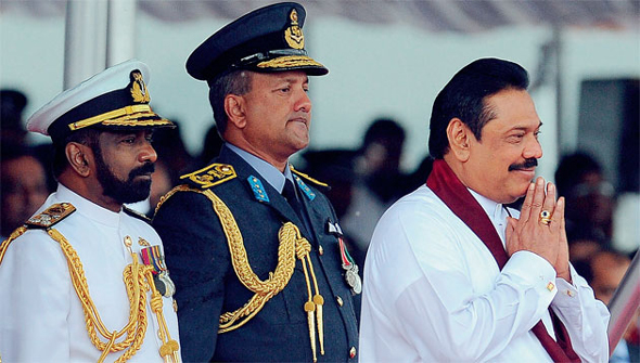 President Rajapaksa with military commanders attend the country’s 65th Independence Day celebrations in Trincomalee on  February 04, 2013. — AFP
