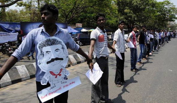 Students in Puducherryform a human chain against the central government's indifferent attitude towards the suffering of Sri Lankan Tamils on Thursday. Photo G. Krishnaswamy | The Hindu
