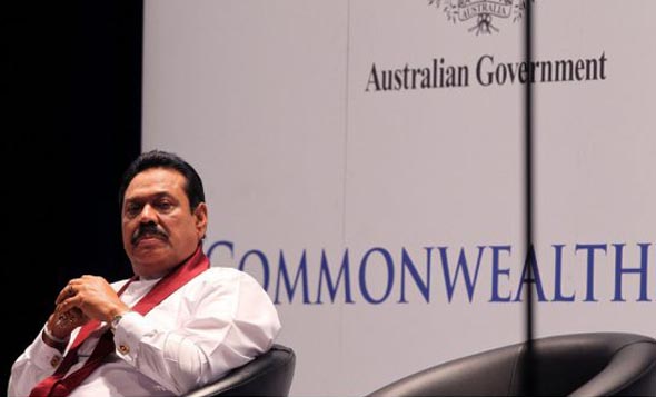  Image Credit: TONY ASHBY / AFP | Sri Lankan President Mahinda Rajapaksa at the Commonwealth Business Forum ahead of the Commonwealth Heads of Governments Meeting in Australia.(Oct. 27, 2011) 