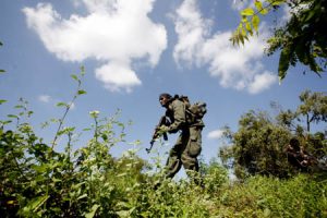 A Sri Lankan army soldier takes part in an operation to regain territory from the Tamil rebels in Jaffna